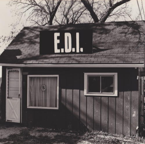 An early EDI clubhouse with a large E.D.I. sign above the entrance